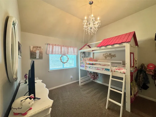 a view of a chairs and table in a balcony