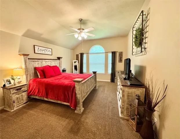 a spacious bathroom with a double vanity sink and a mirror