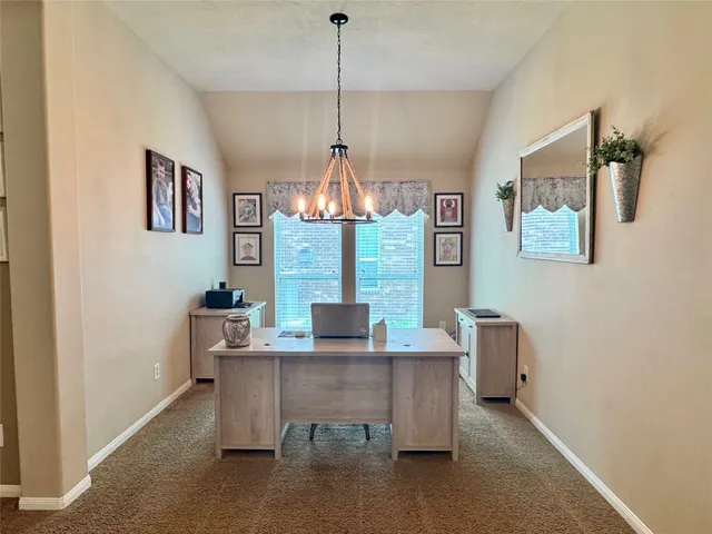 a kitchen with stainless steel appliances granite countertop a stove refrigerator sink and microwave