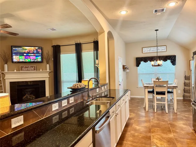 a view of a dining room with furniture