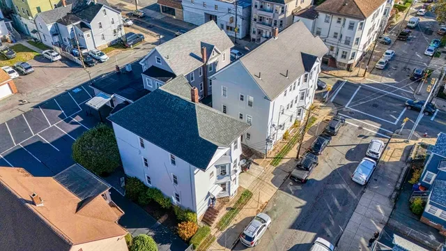 aerial view of a house with an outdoor space