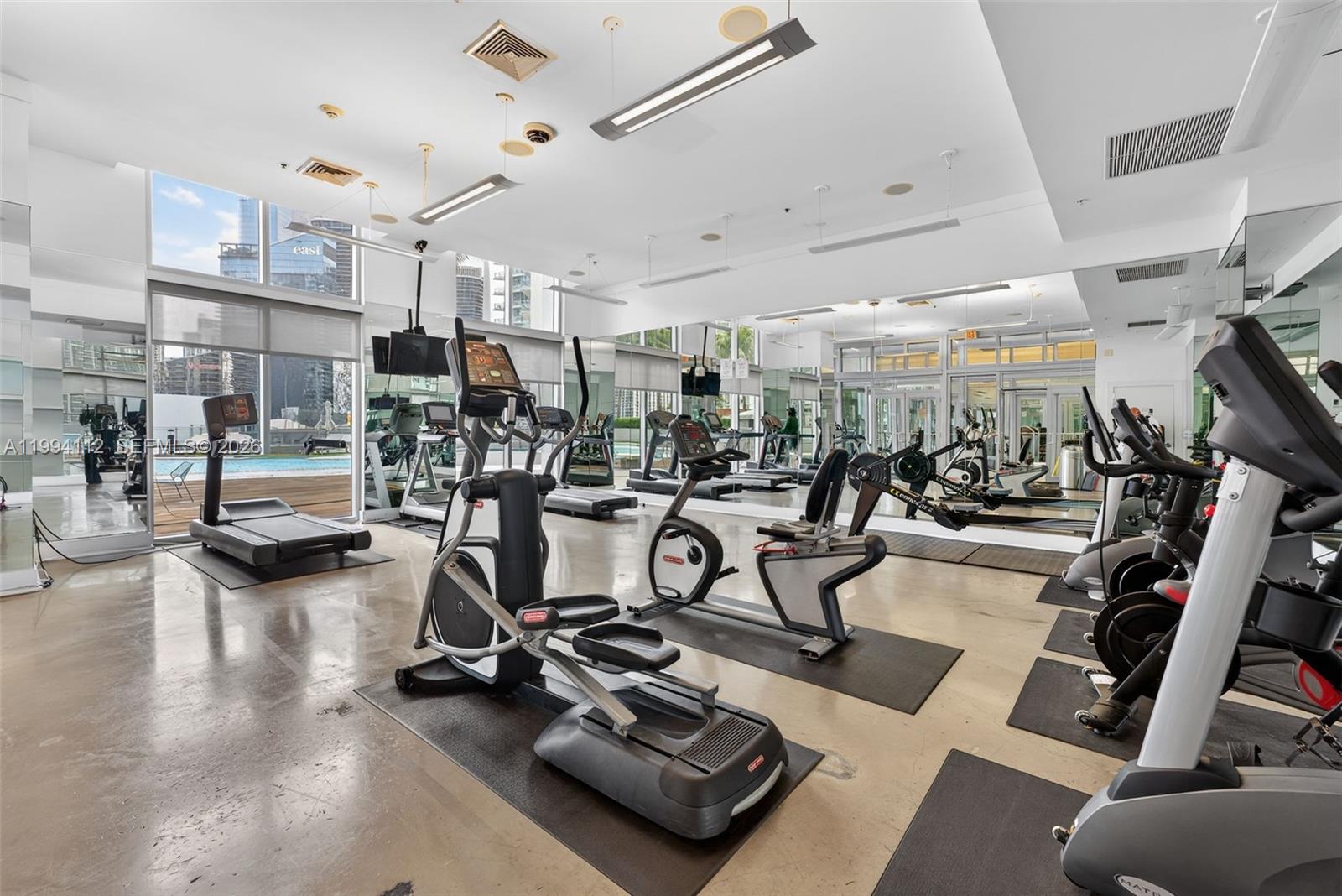90 Southwest 3rd Street, Unit 1105 Miami, FL 33130 - Photo 11 of 11 a view of a room with gym equipment