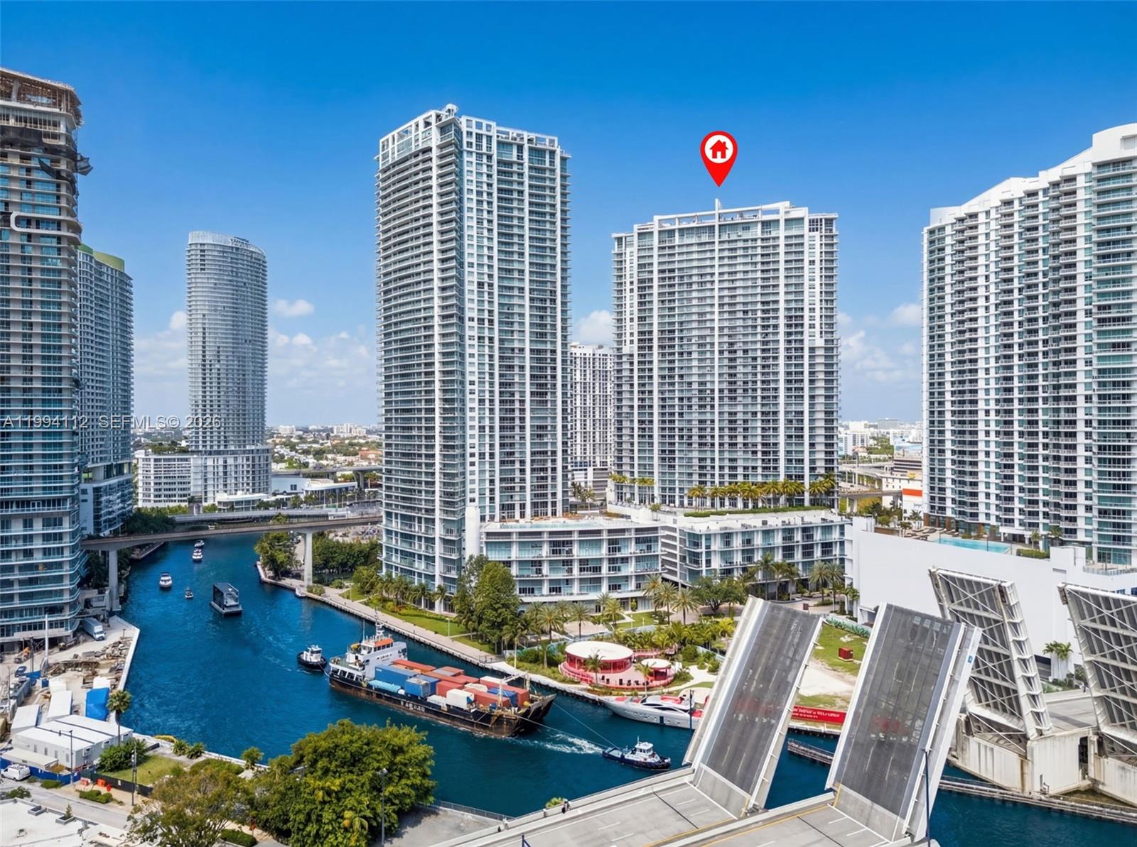 90 Southwest 3rd Street, Unit 1105 Miami, FL 33130 - Photo 8 of 11 a view of roof deck with two chairs and a potted plant