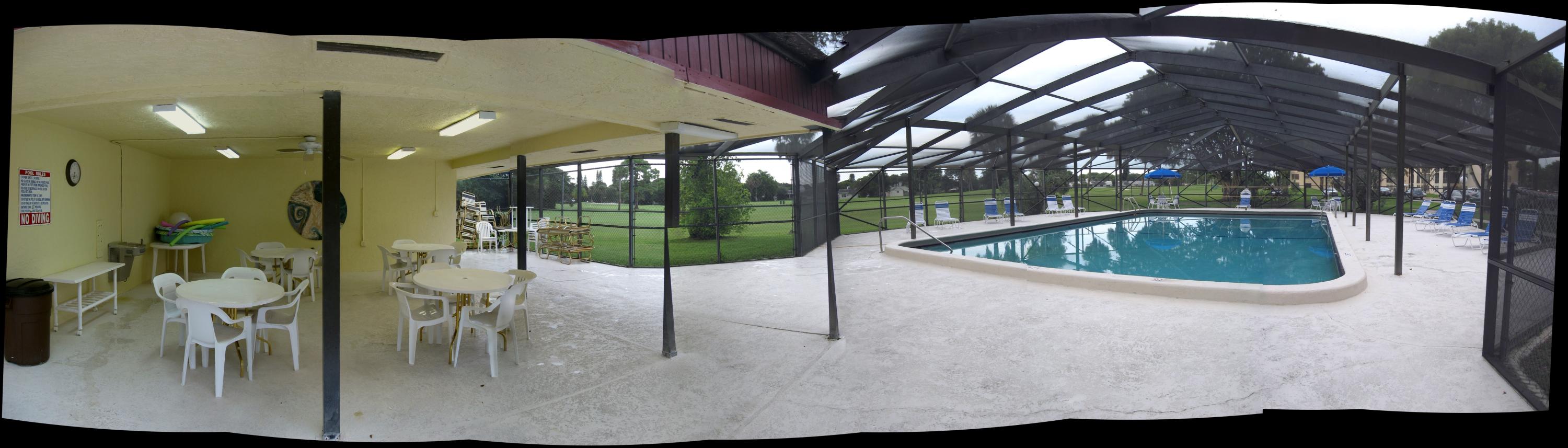 9233 Southwest 8th Street, Unit 402 Boca Raton, FL 33428 - Photo 13 of 35 12 9233 Bldg Pool Area Pano