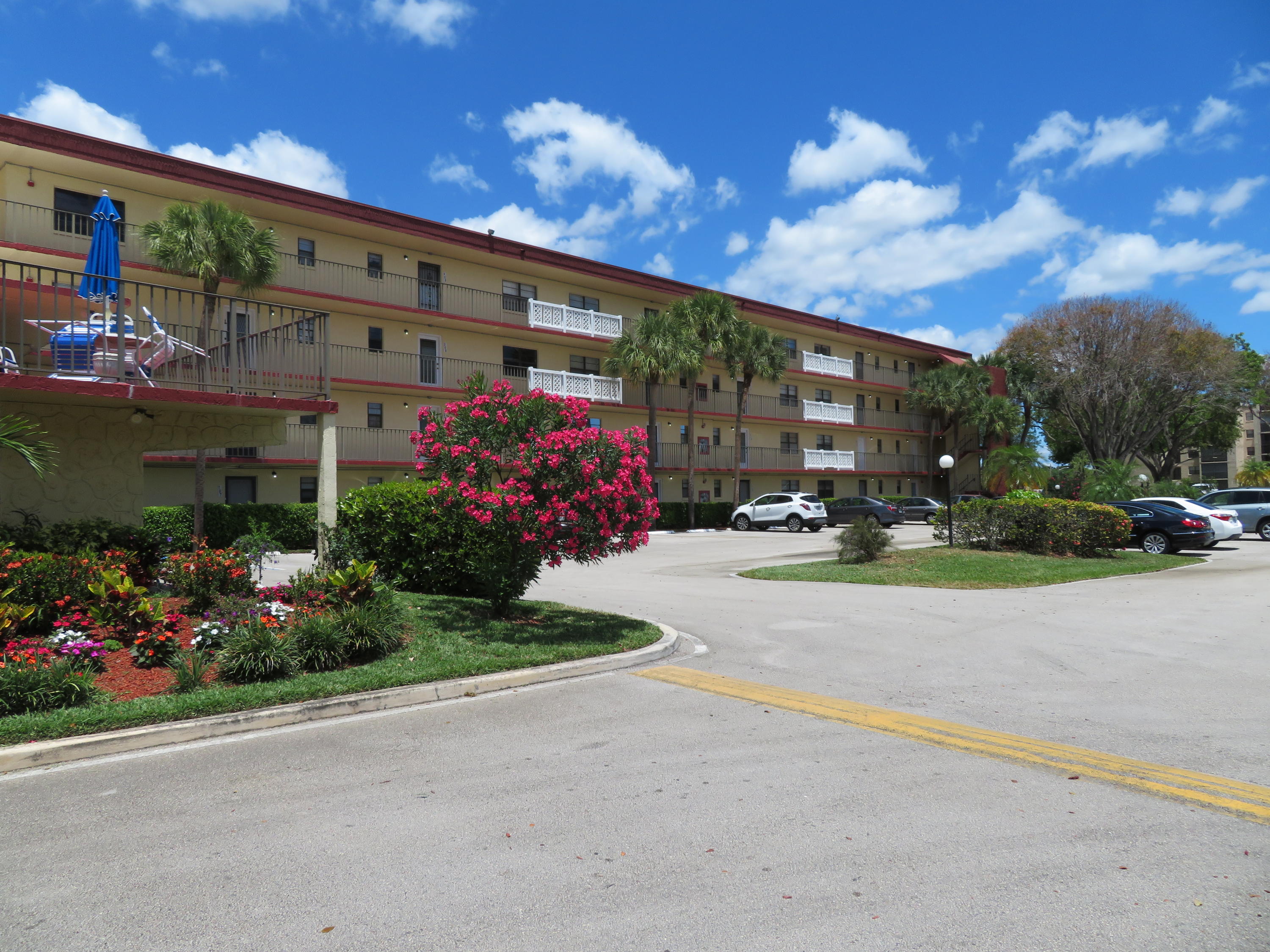 9233 Southwest 8th Street, Unit 402 Boca Raton, FL 33428 - Photo 2 of 35 1 9233 BLDG Front EAST Side
