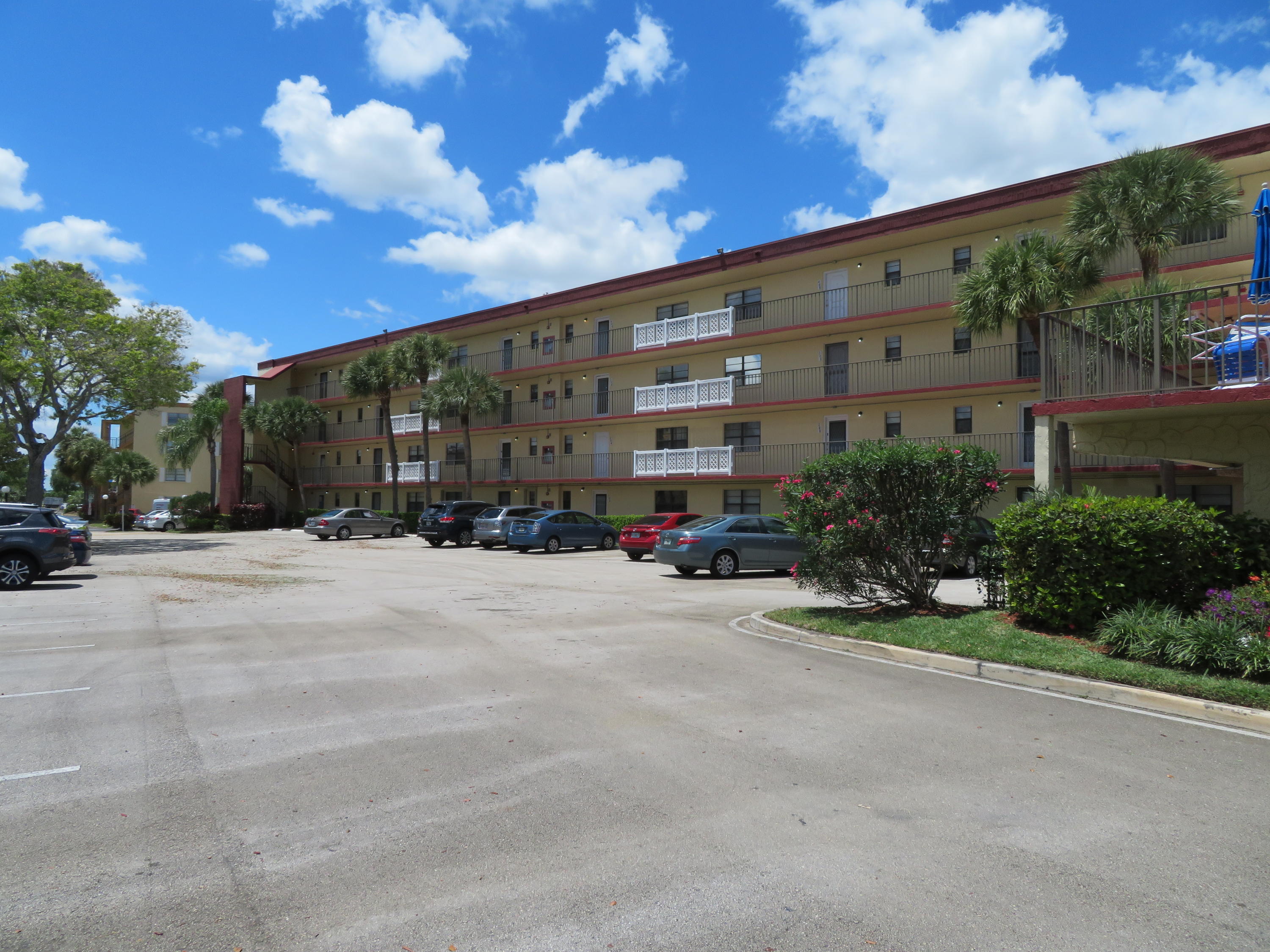 9233 Southwest 8th Street, Unit 402 Boca Raton, FL 33428 - Photo 3 of 35 1 9233 BLDG Front WEST Side