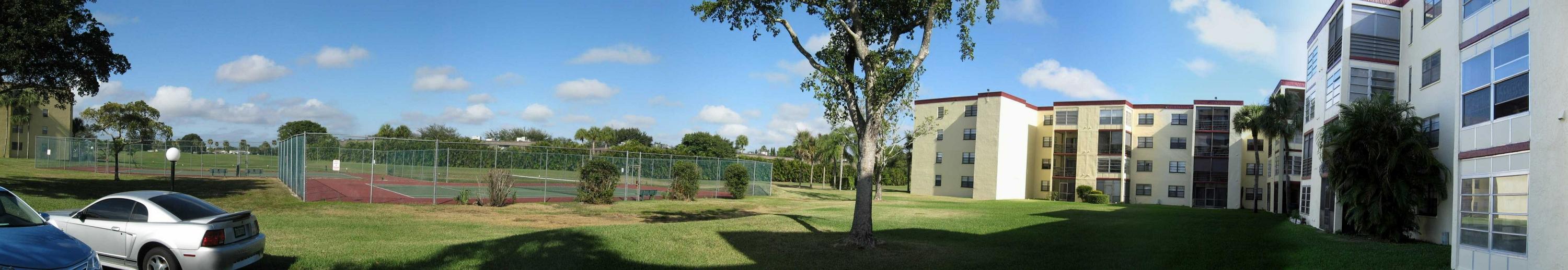 9233 Southwest 8th Street, Unit 402 Boca Raton, FL 33428 - Photo 34 of 35 57 9233 Bldg Rear- West Side Pano