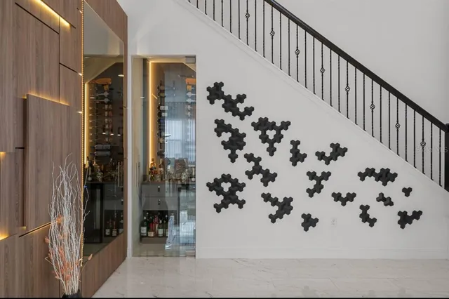 a view of staircase with white walls