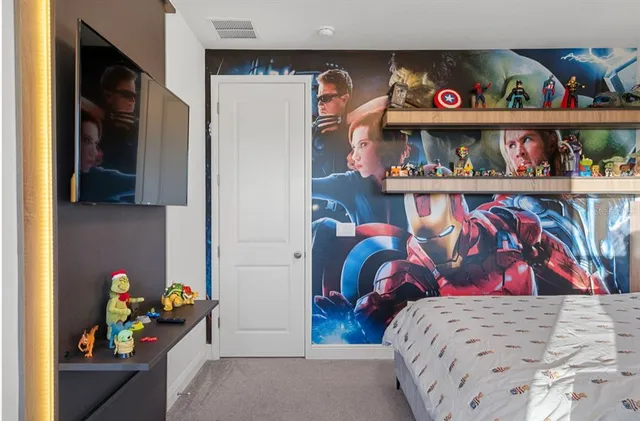 a bathroom with a sink toilet vanity and tub