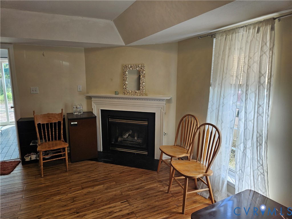 1307 Spruance Road Richmond, VA 23225 - Photo 7 of 7 Wood-finish flooring, white mantel, fireplace with