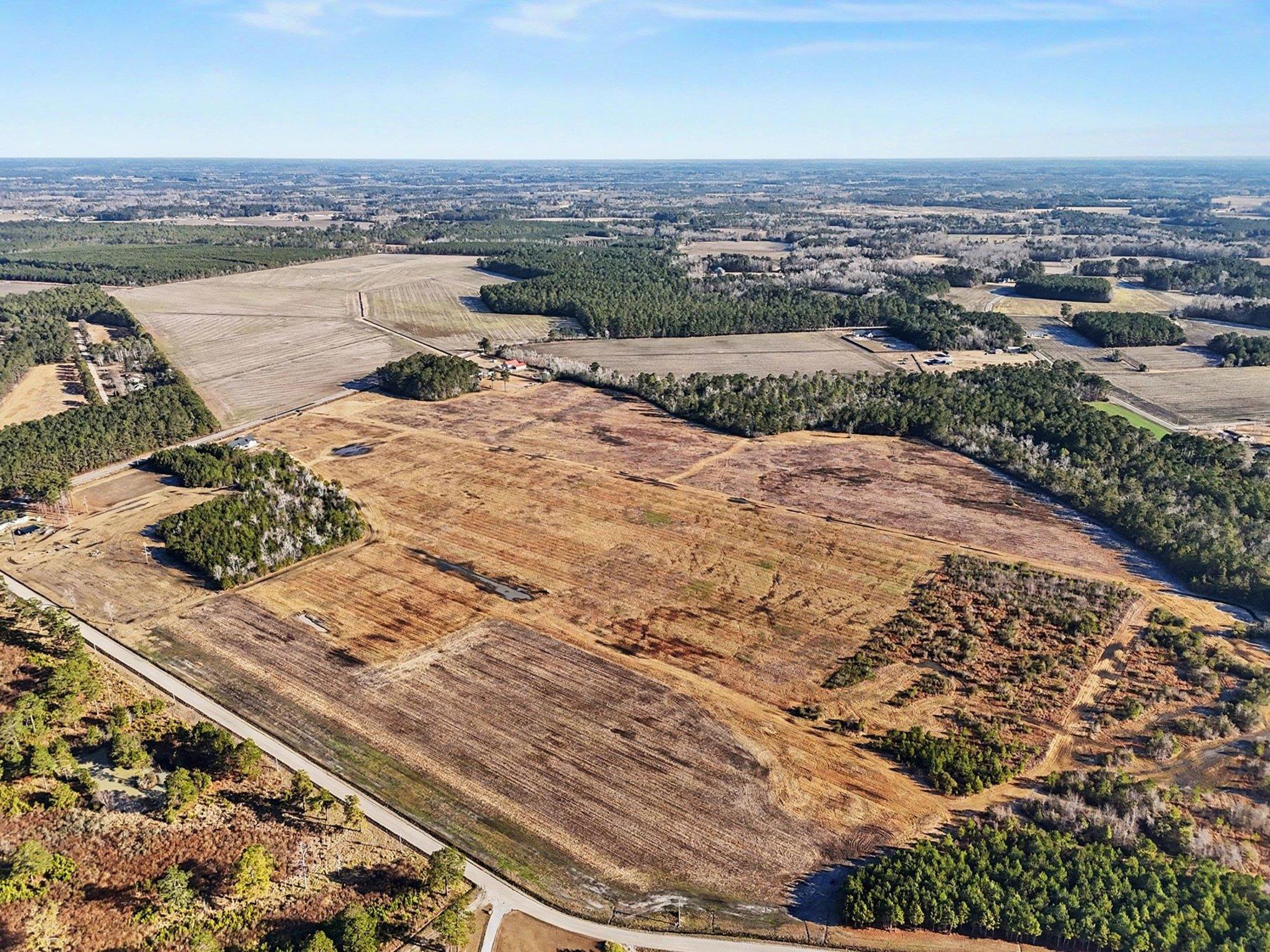 Tbd 87-acres Tbd 87-acres Airport Road Loris, SC 29569 - Photo 7 of 20 Aerial overview of property's location with rural landscape and large plots for crops
