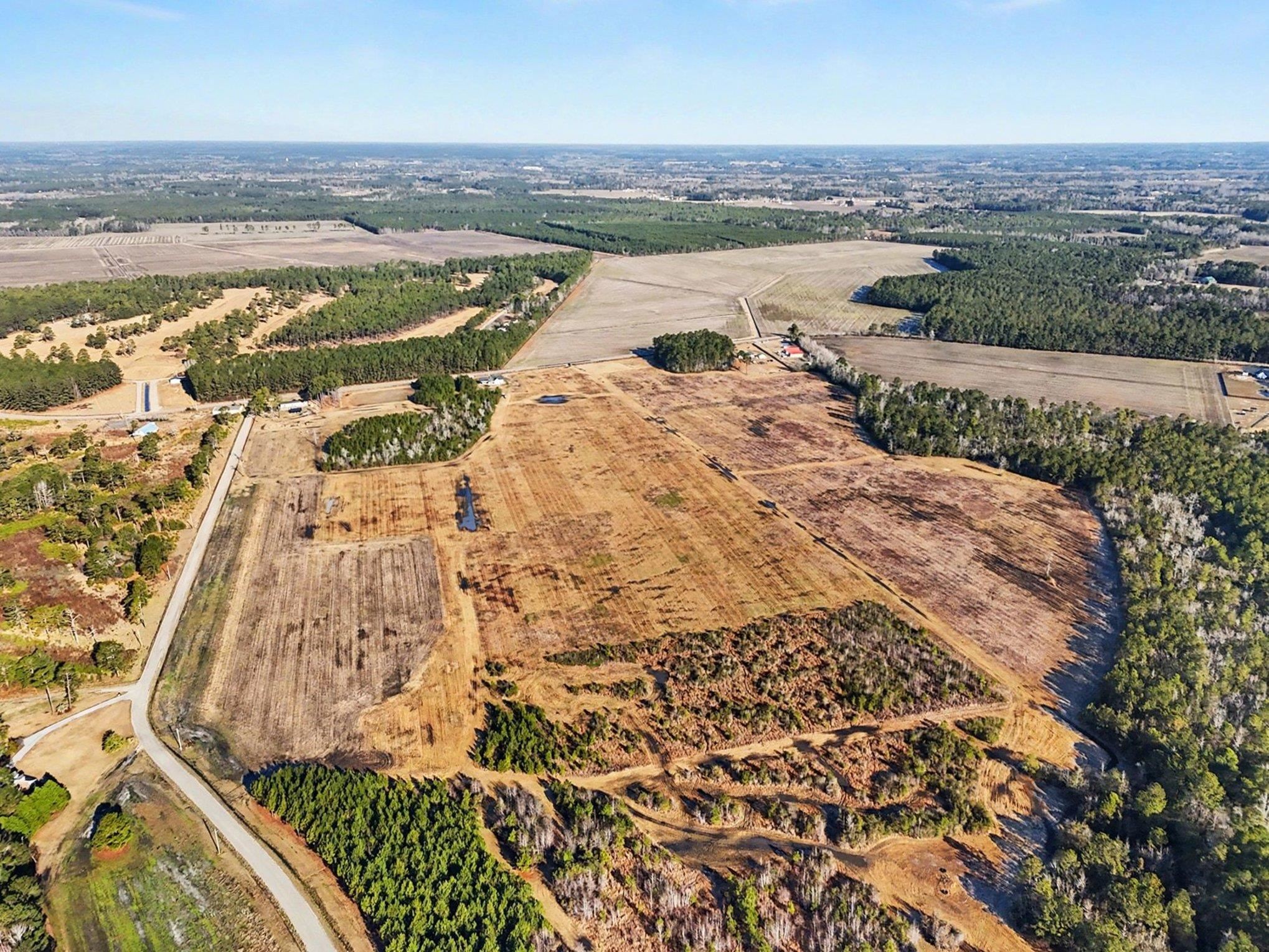 Tbd 87-acres Tbd 87-acres Airport Road Loris, SC 29569 - Photo 9 of 20 Aerial overview of property's location with large plots for crops and rural landscape