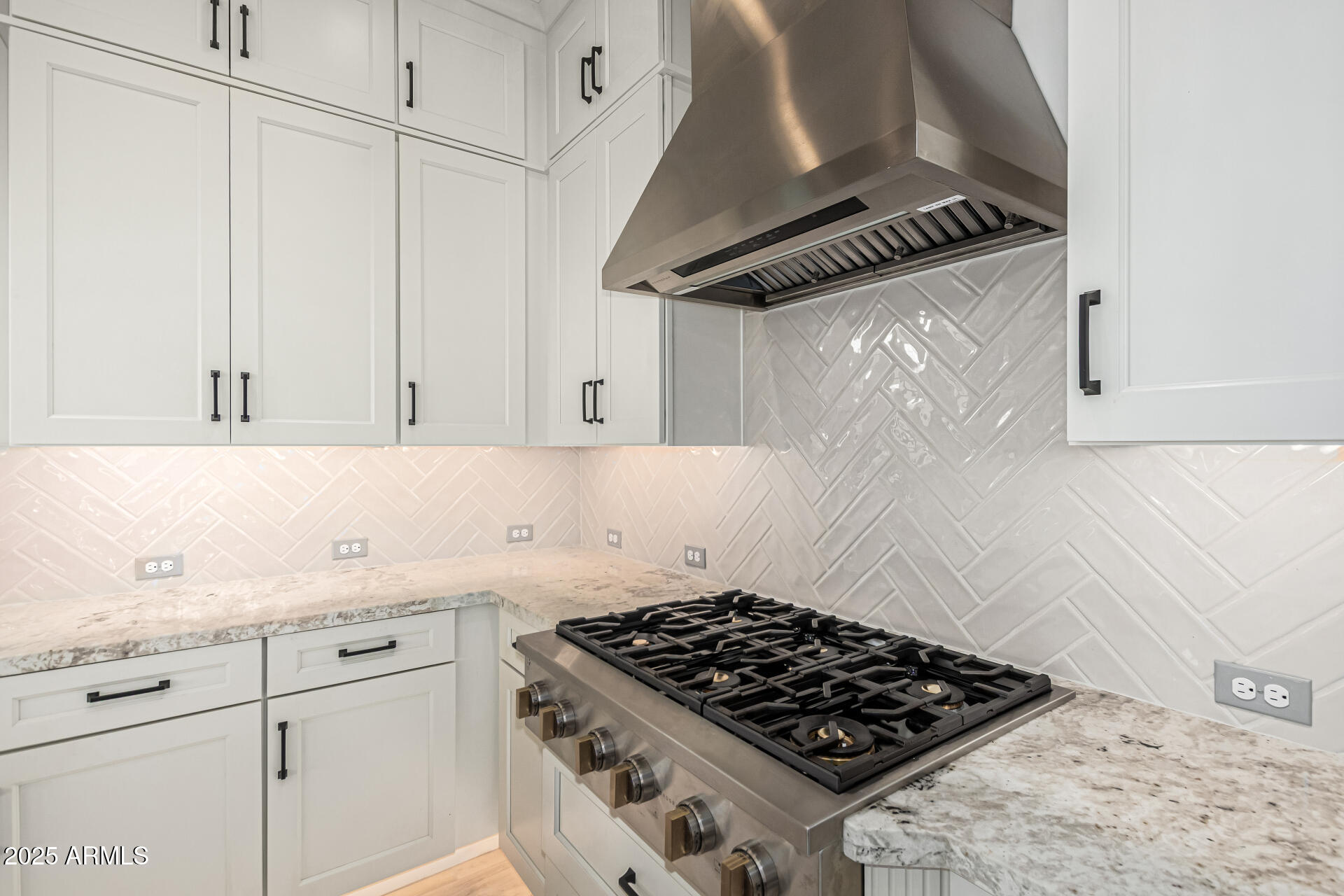 20709 West Rattler Road Buckeye, AZ 85396 - Photo 15 of 66 a kitchen with white cabinets and appliances