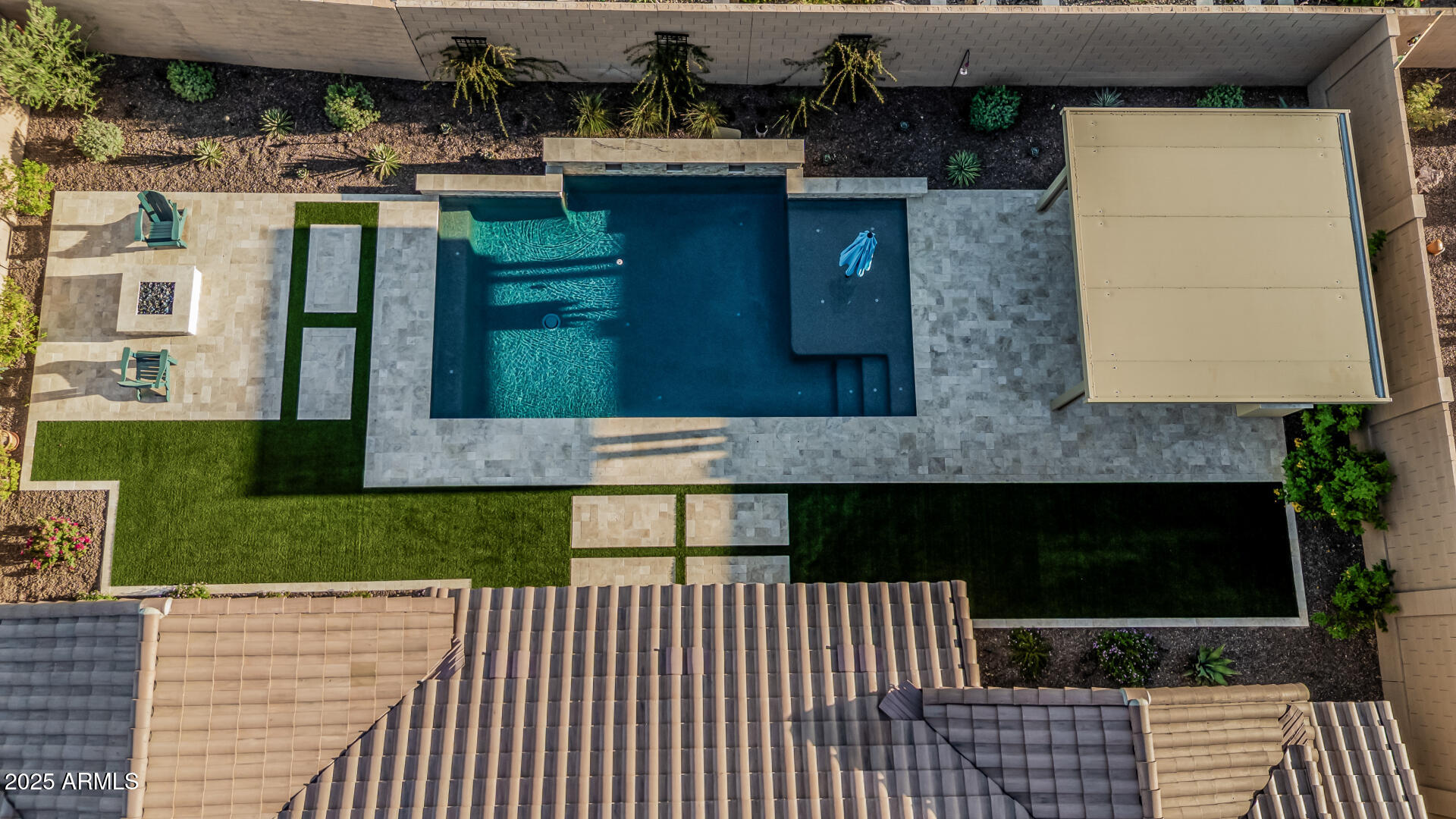 20709 West Rattler Road Buckeye, AZ 85396 - Photo 3 of 66 a front view of a house with a yard