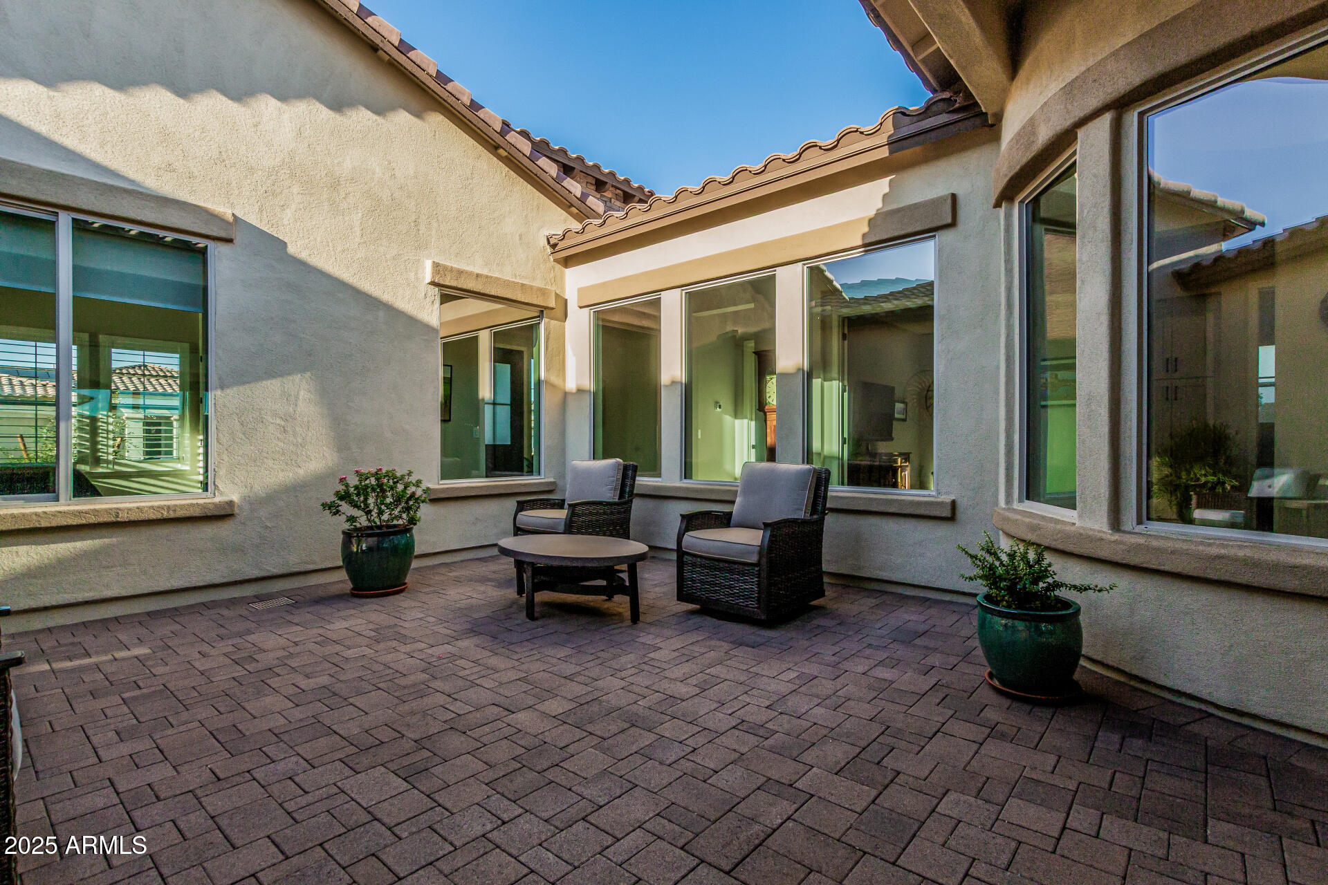 20709 West Rattler Road Buckeye, AZ 85396 - Photo 38 of 66 a view of a house with backyard sitting area