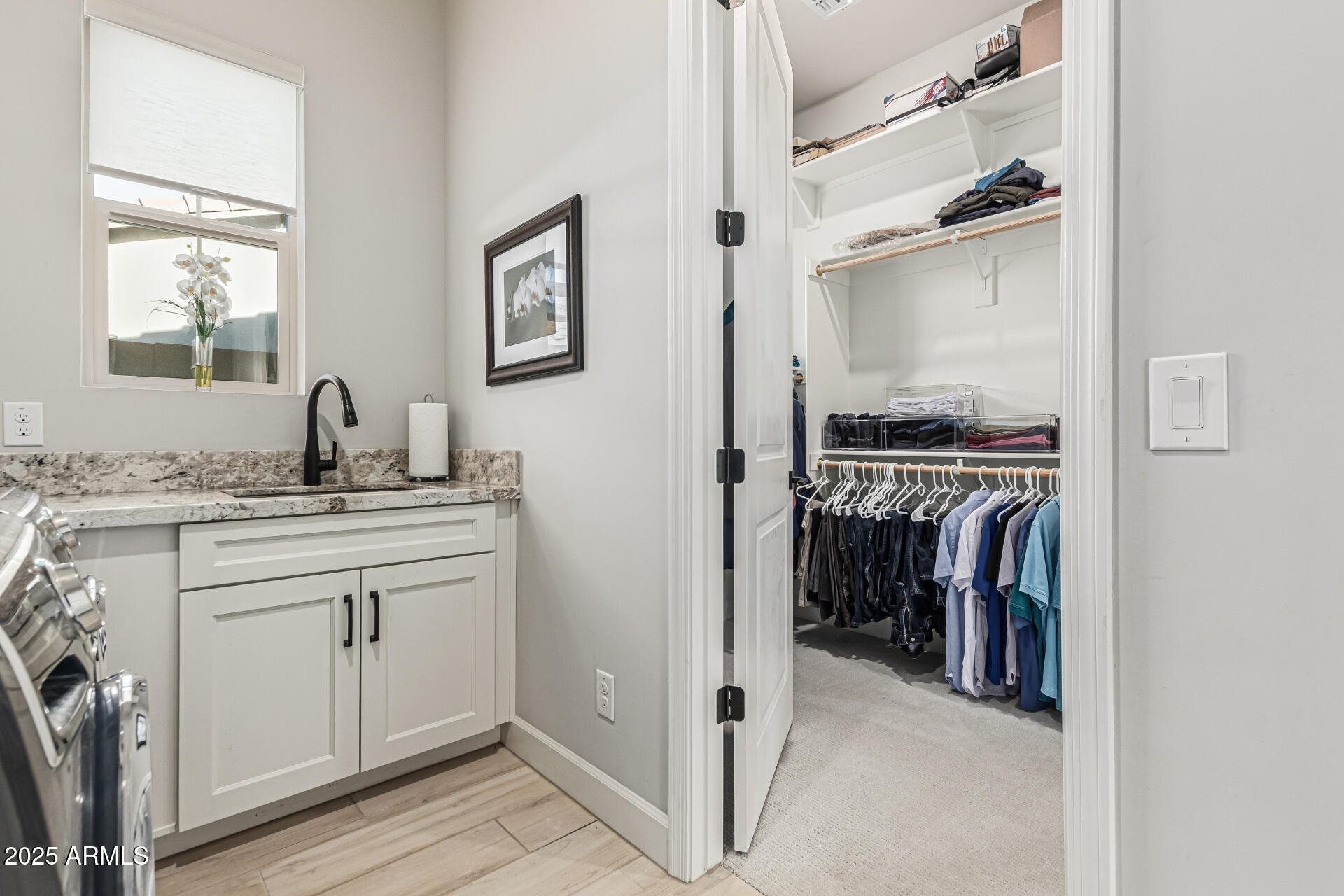 20709 West Rattler Road Buckeye, AZ 85396 - Photo 41 of 66 a view of a sink and a mirror