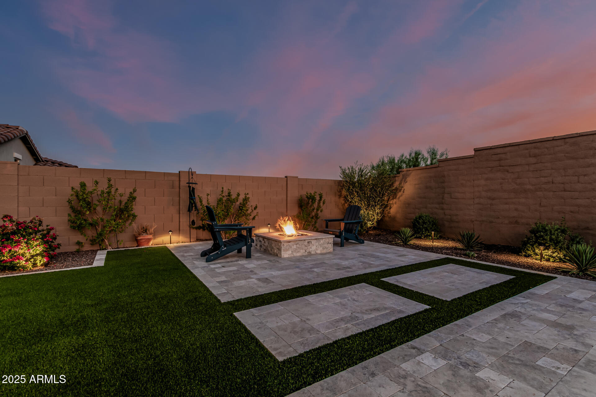 20709 West Rattler Road Buckeye, AZ 85396 - Photo 44 of 66 a view of a backyard with sitting area