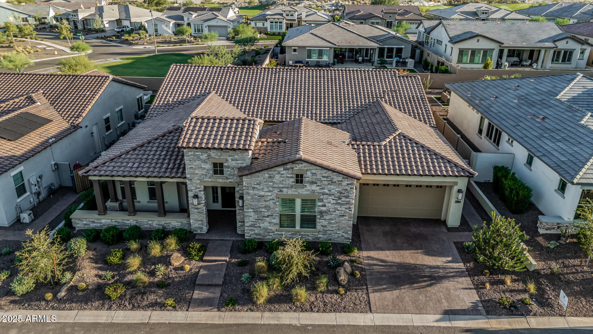 20709 West Rattler Road Buckeye, AZ 85396 - Photo 50 of 66 an aerial view of a house with a garden