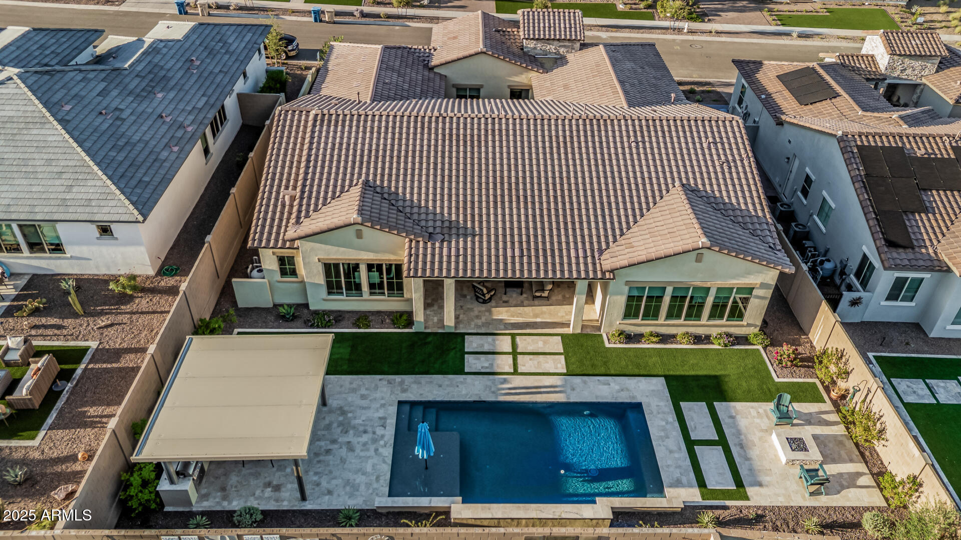 20709 West Rattler Road Buckeye, AZ 85396 - Photo 51 of 66 a front view of a house with a yard