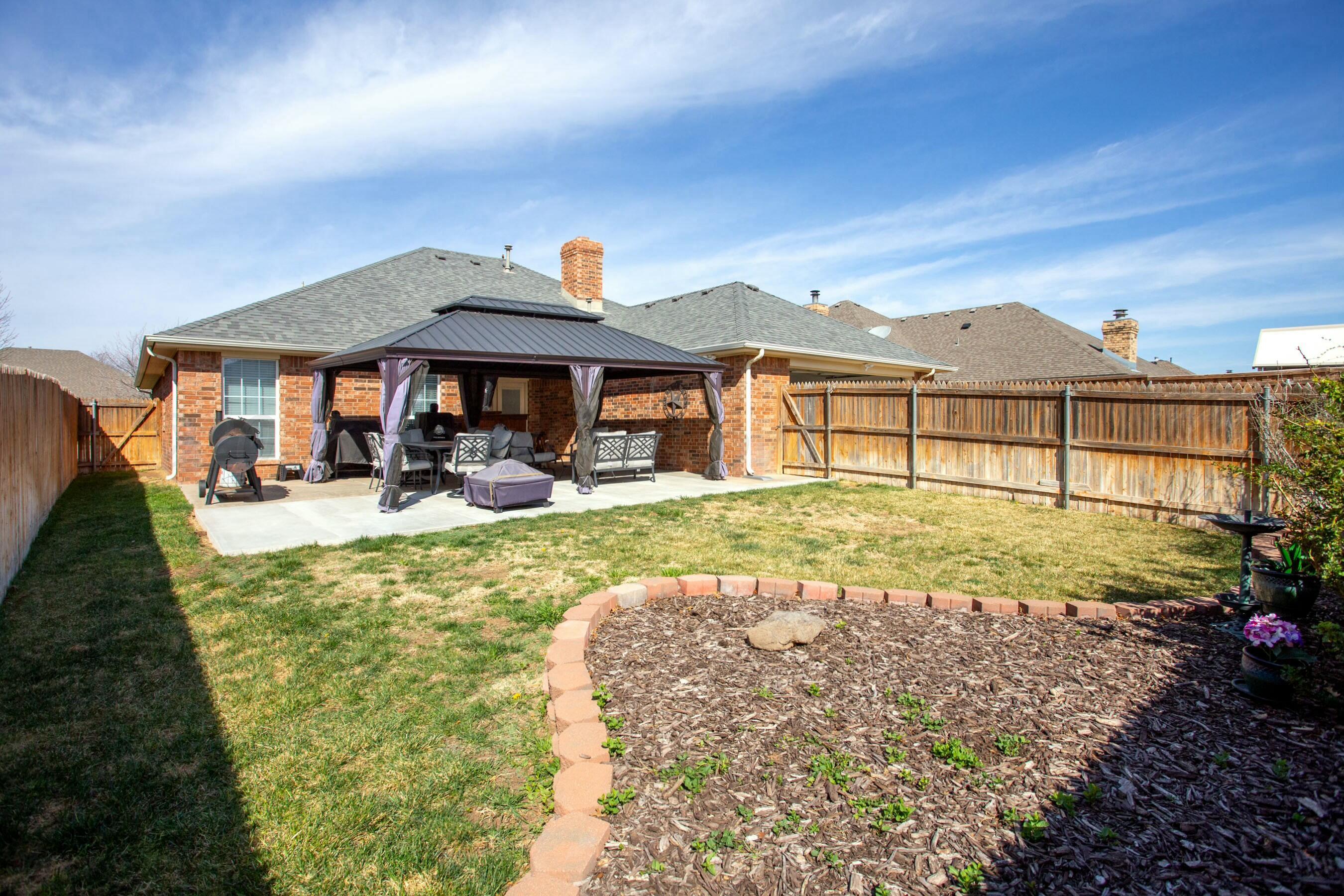 8103 El Paso Drive Amarillo, TX 79118 - Photo 29 of 40 a view of a house with a ocean view