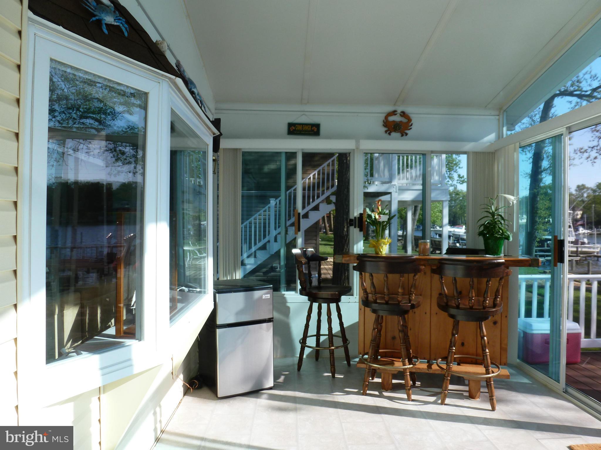 398 Riverside Drive Pasadena, MD 21122 - Photo 19 of 30 Waterside Sunroom