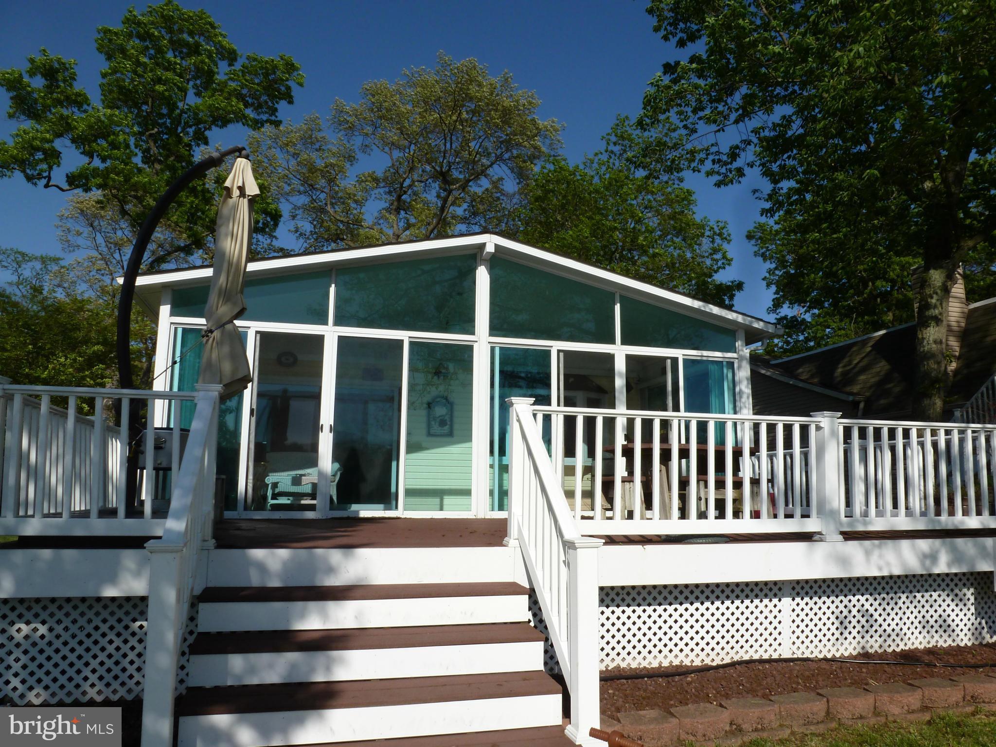 398 Riverside Drive Pasadena, MD 21122 - Photo 21 of 30 Deck and Sunroom waterside