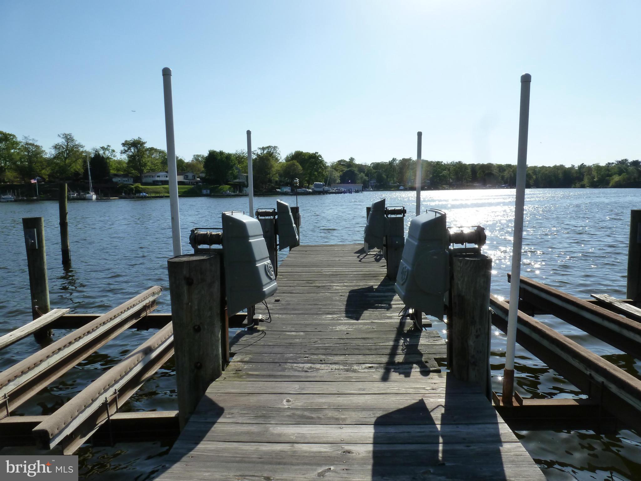 398 Riverside Drive Pasadena, MD 21122 - Photo 23 of 30 Pier with 2 x 10k boat lifts
