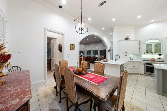 a utility room with sink dryer and washer