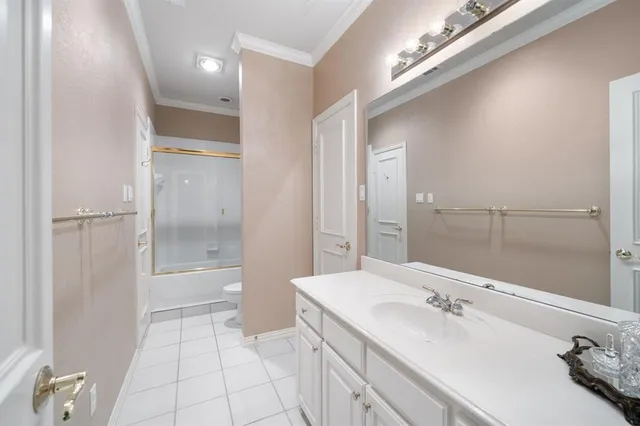 a balcony with furniture and garden view