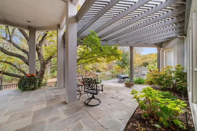 a view of a table and chairs in roof deck