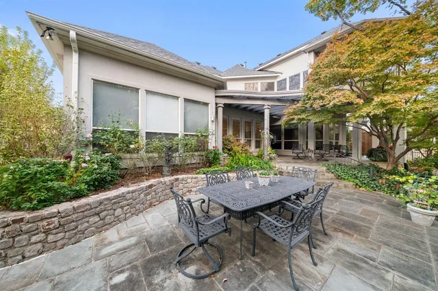 a view of house with a yard