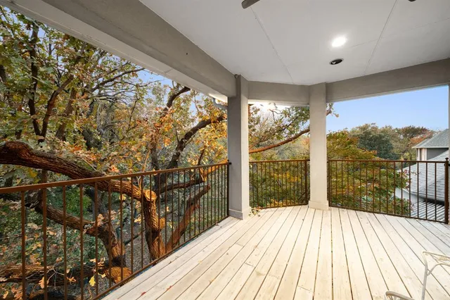 a view of backyard with outdoor seating and green space