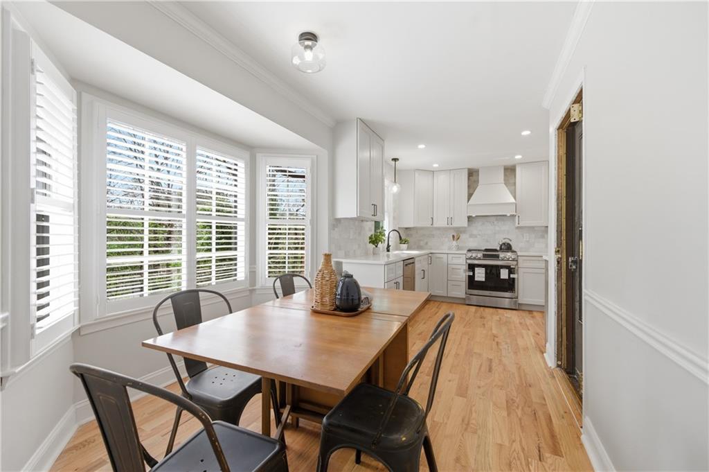 3571 Midvale Forest Court Tucker, GA 30084 - Photo 18 of 53 a view of a dining room with furniture window and outside view