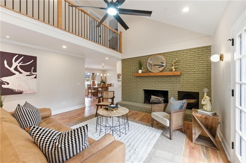 3571 Midvale Forest Court Tucker, GA 30084 - Photo 22 of 53 a living room with furniture and a fireplace