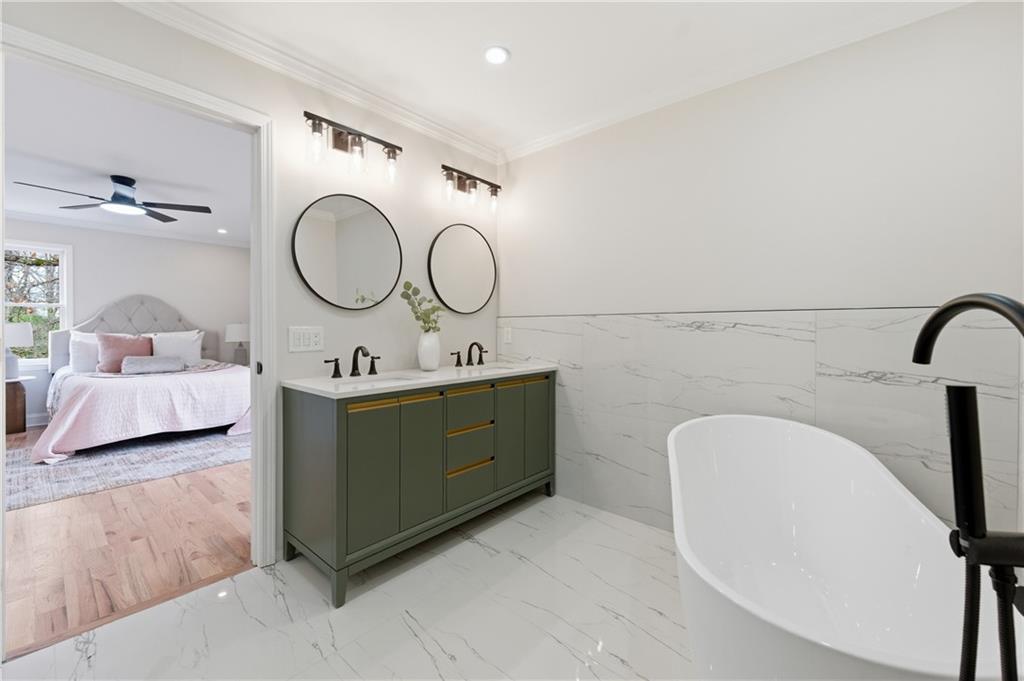 3571 Midvale Forest Court Tucker, GA 30084 - Photo 30 of 53 a bathroom with a double vanity sink and a mirror