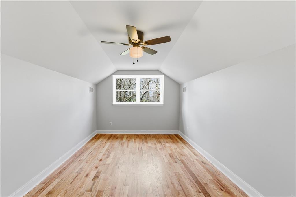 3571 Midvale Forest Court Tucker, GA 30084 - Photo 35 of 53 an empty room with a window and a ceiling fan