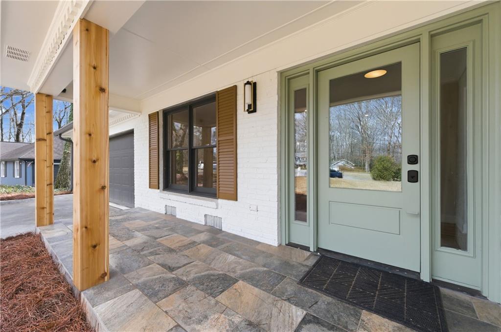 3571 Midvale Forest Court Tucker, GA 30084 - Photo 4 of 53 a view of a entryway door front of house