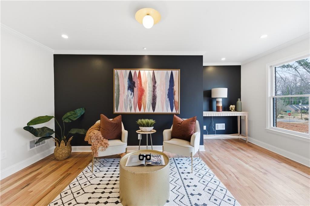 3571 Midvale Forest Court Tucker, GA 30084 - Photo 9 of 53 a living room with furniture and a window