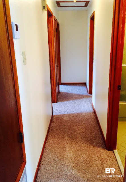 39660 Hannis Williams Road Bay Minette, AL 36507 - Photo 18 of 32 For Sale: 39660 Hannis Williams Road, Bay Minette, AL 36507 Hallway to bedrooms