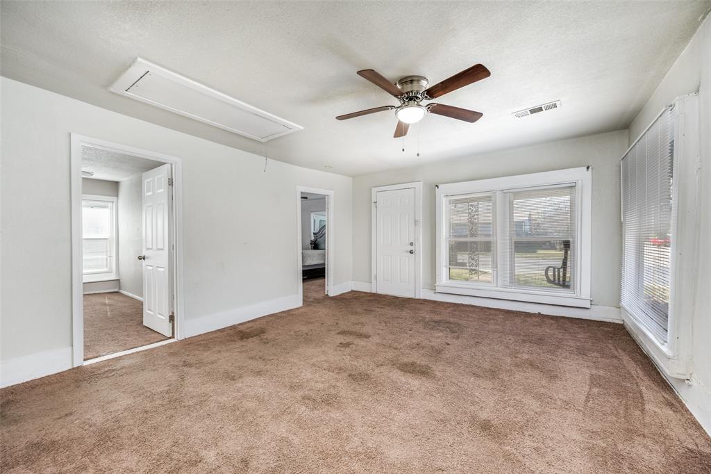 701 Lakey Street Denton, TX 76205 - Photo 14 of 25 a view of an empty room with a window