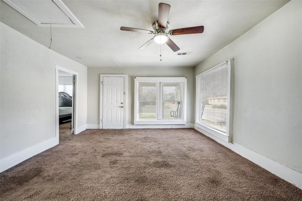701 Lakey Street Denton, TX 76205 - Photo 15 of 25 a view of an empty room with a window
