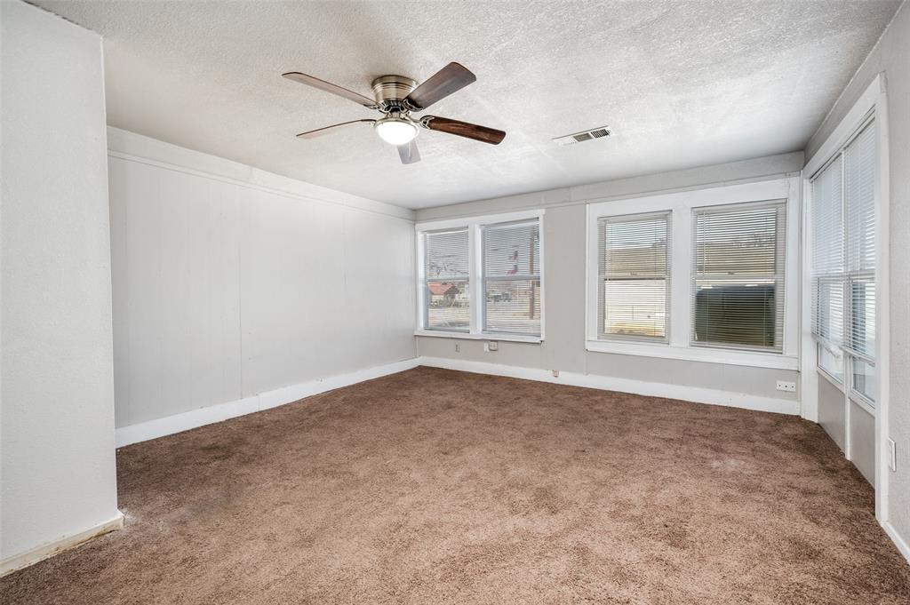 701 Lakey Street Denton, TX 76205 - Photo 20 of 25 a view of an empty room with a window
