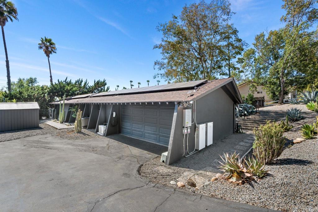 754 El Rancho Drive El Cajon, CA 92019 - Photo 46 of 55 a view of a house with a yard and garage