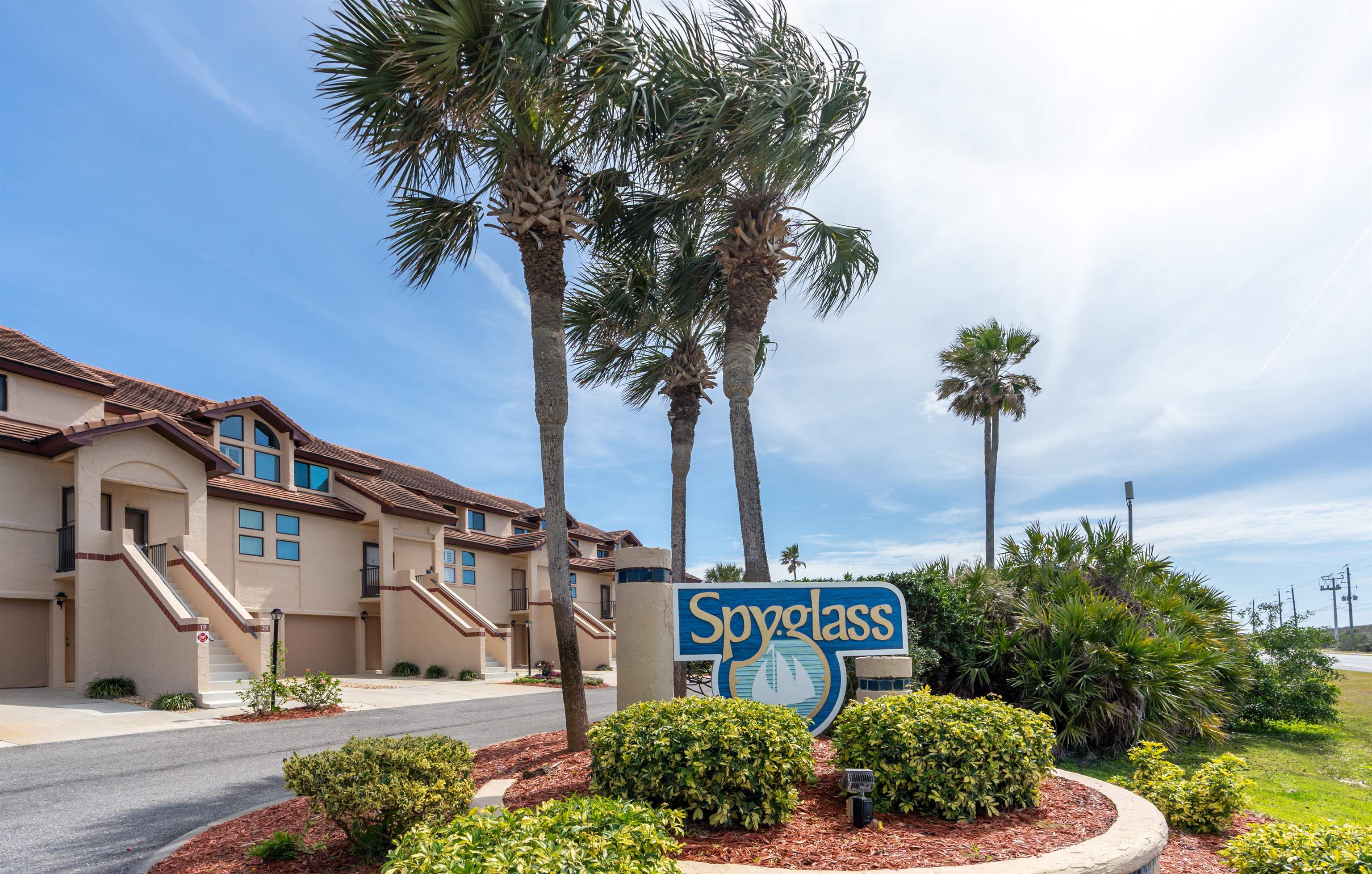 8200 A1A South, Unit 13 St. Augustine, FL 32080 - Photo 35 of 56 a sign board with buildings in the background