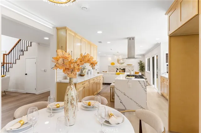 a view of a kitchen with a large window
