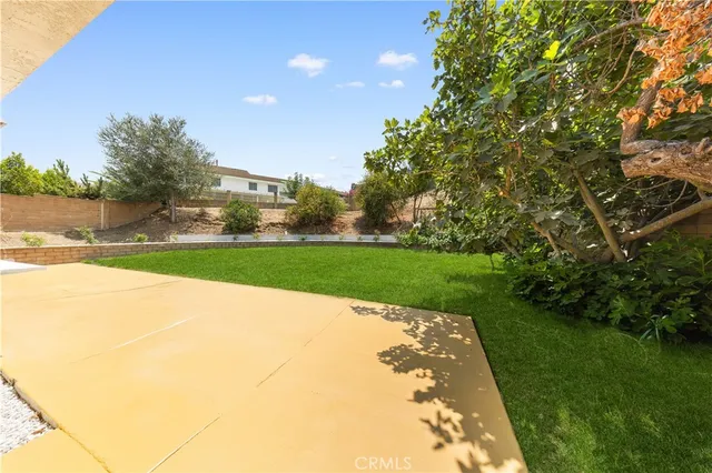 a view of a garden and basketball court