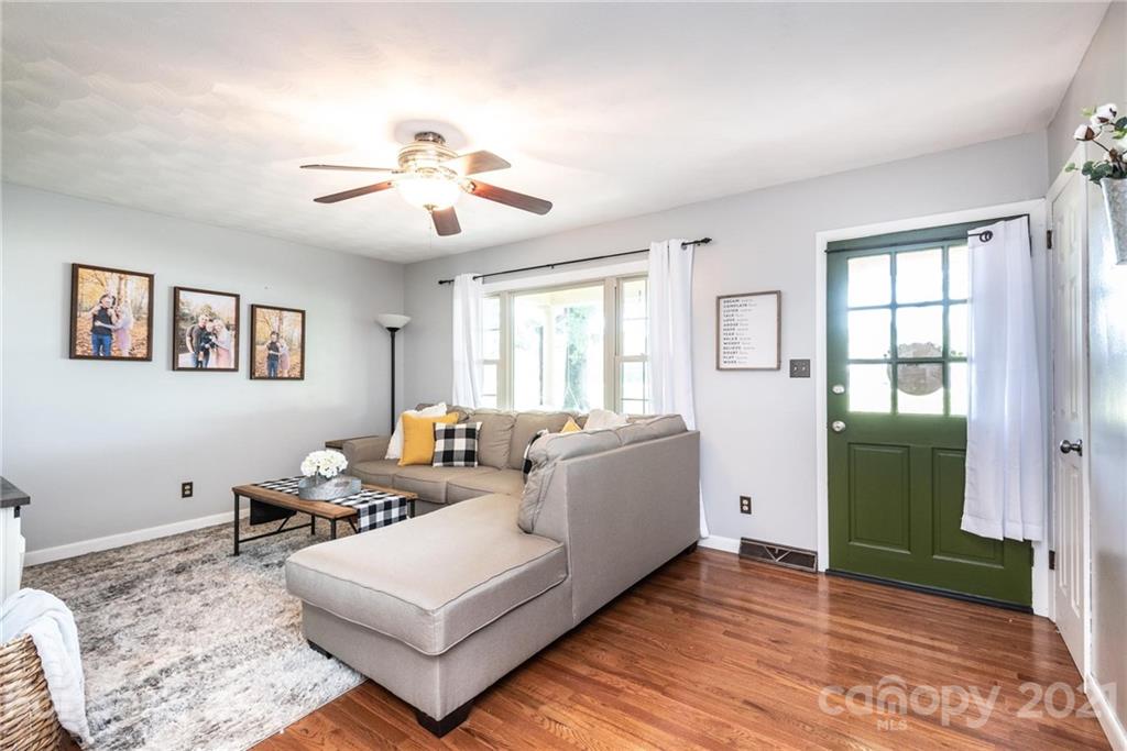 3064 Sandy Ford Road Newton, NC 28658 - Photo 14 of 41 a living room with furniture and a window