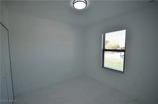an empty room with a window