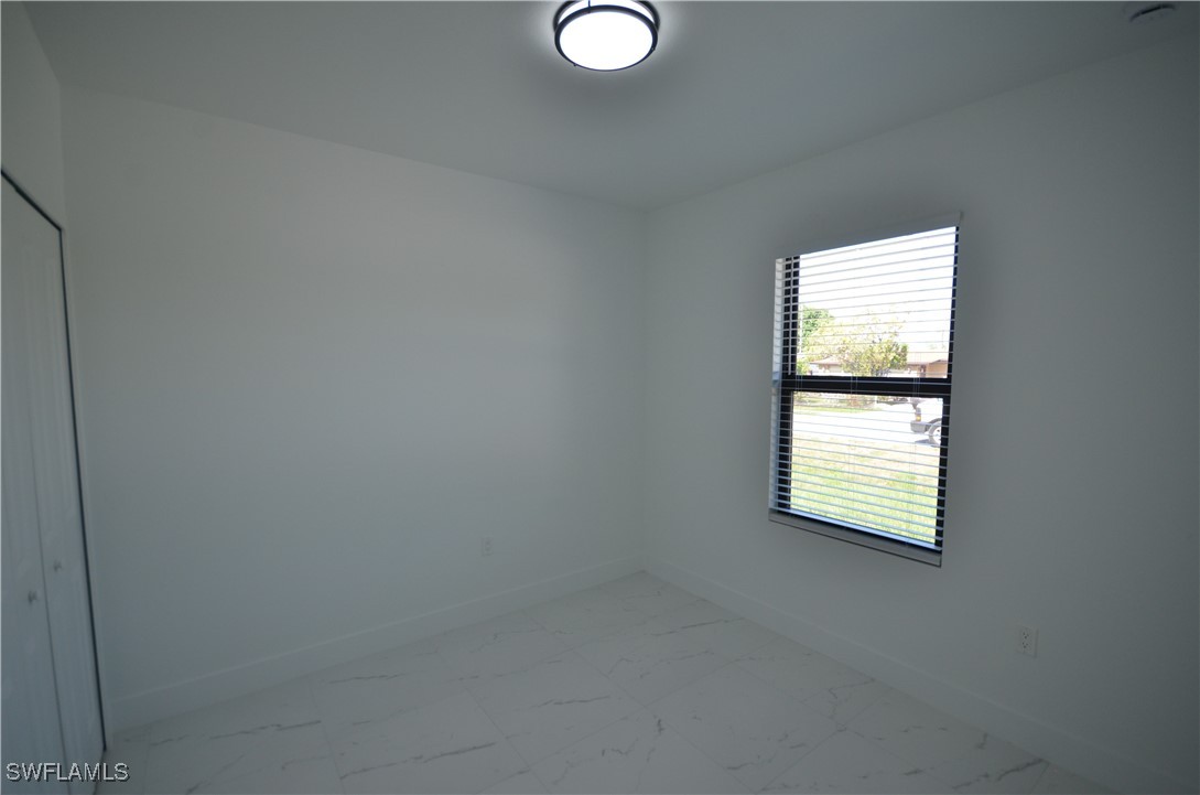 2132 Barker Boulevard Fort Myers, FL 33916 - Photo 13 of 36 an empty room with a window