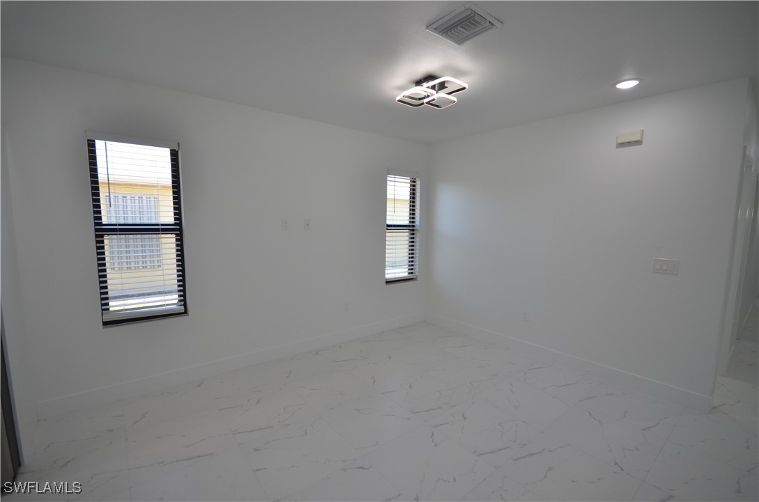 2132 Barker Boulevard Fort Myers, FL 33916 - Photo 20 of 36 a view of empty room with windows